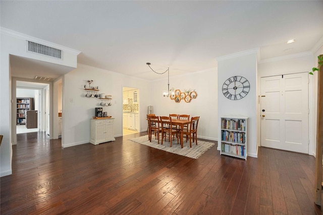 2230 S Piney Point Rd Unit 206, Houston, TX 77063 - dining area with dark wood-type flooring, a chandelier, and ornamental molding