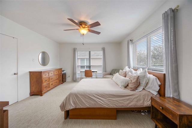 2230 S Piney Point Rd Unit 206, Houston, TX 77063 - bedroom featuring light colored carpet and a ceiling fan