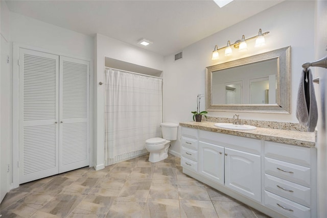 2230 S Piney Point Rd Unit 206, Houston, TX 77063 - bathroom with a closet and vanity
