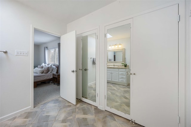 2230 S Piney Point Rd Unit 206, Houston, TX 77063 - hall featuring a sink