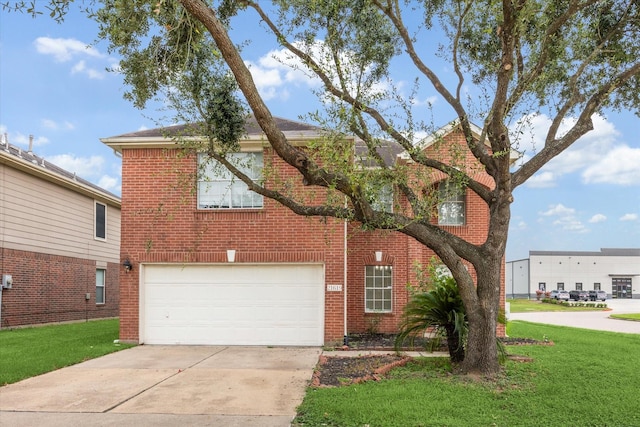 21619 Knightsbrook Ln, Katy, TX 77449 - traditional-style home featuring concrete driveway, brick siding, an attached garage, and a front yard