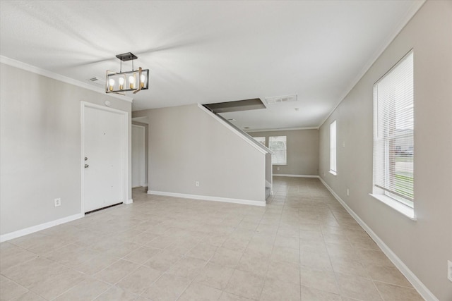 21619 Knightsbrook Ln, Katy, TX 77449 - spare room featuring ornamental molding, a chandelier, plenty of natural light, and light tile patterned flooring