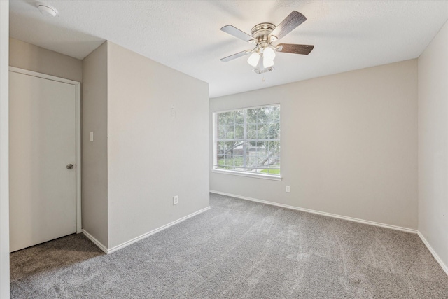 21619 Knightsbrook Ln, Katy, TX 77449 - carpeted spare room with baseboards and a ceiling fan