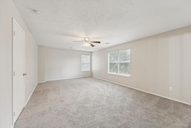 21619 Knightsbrook Ln, Katy, TX 77449 - carpeted spare room featuring ceiling fan, a smoke detector, and a textured ceiling