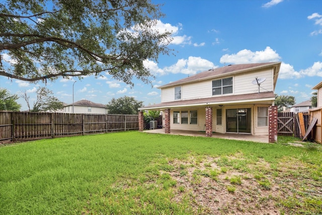 21619 Knightsbrook Ln, Katy, TX 77449 - back of property featuring a patio area and a fenced backyard