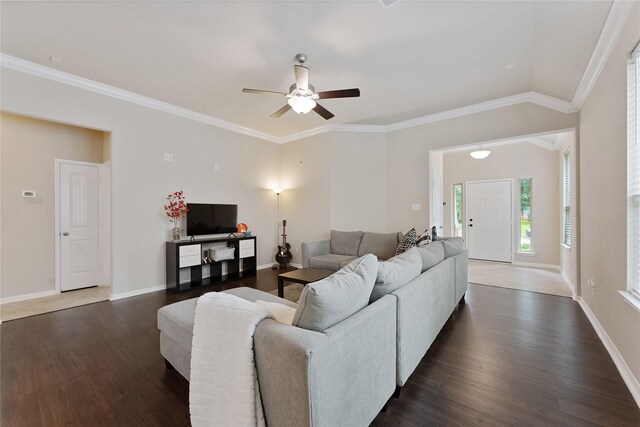 20726 Ranch Mill Ln, Cypress, TX 77433 - living room with a ceiling fan, dark wood-style flooring, and ornamental molding