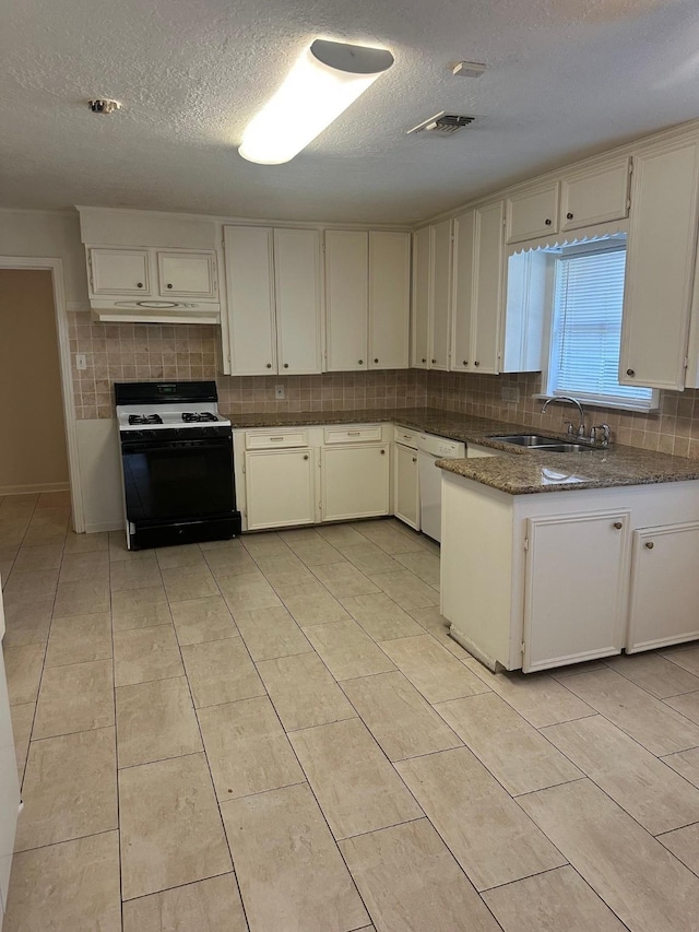 9337 Walterville Rd, Houston, TX 77080 - kitchen with range with gas stovetop, under cabinet range hood, a textured ceiling, backsplash, and dishwasher