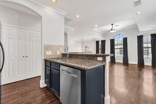 1320 Studer St, Houston, TX 77007 - kitchen with dishwasher, dark wood-style flooring, a ceiling fan, backsplash, and dark stone counters
