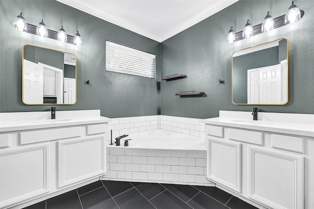 1320 Studer St, Houston, TX 77007 - bathroom featuring two vanities, tile patterned floors, a garden tub, and a textured wall