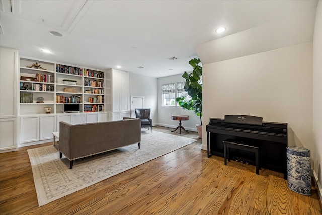 1126 Lake Pointe Pkwy, Sugar Land, TX 77478 - living area featuring attic access, wood finished floors, and recessed lighting