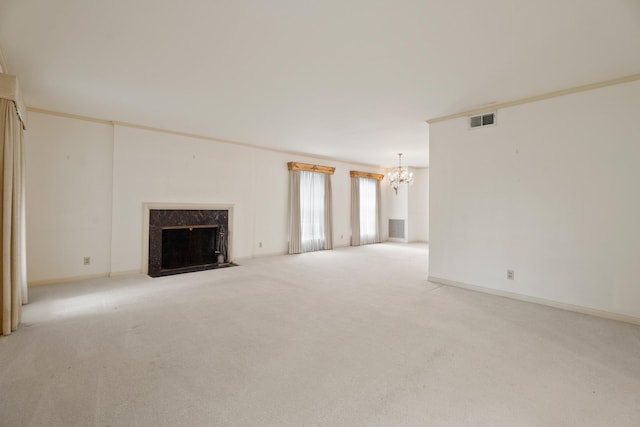 303 S Jackson St, Alvin, TX 77511 - unfurnished living room with a chandelier, light colored carpet, and a fireplace