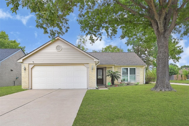 20042 S Pecos Valley Trl, Katy, TX 77449 - single story home with concrete driveway, brick siding, and a front lawn