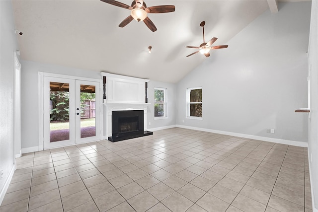 20042 S Pecos Valley Trl, Katy, TX 77449 - unfurnished living room featuring french doors, light tile patterned floors, plenty of natural light, ceiling fan, and high vaulted ceiling