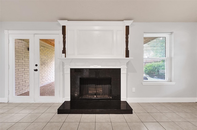 20042 S Pecos Valley Trl, Katy, TX 77449 - detailed view of a fireplace with raised hearth and baseboards