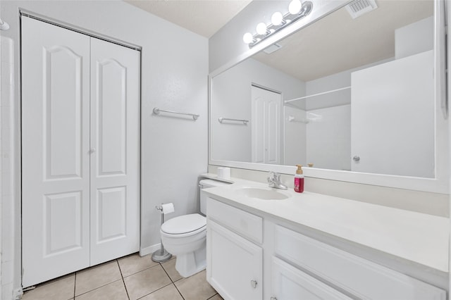 20042 S Pecos Valley Trl, Katy, TX 77449 - bathroom with a closet, vanity, tile patterned floors, and a shower