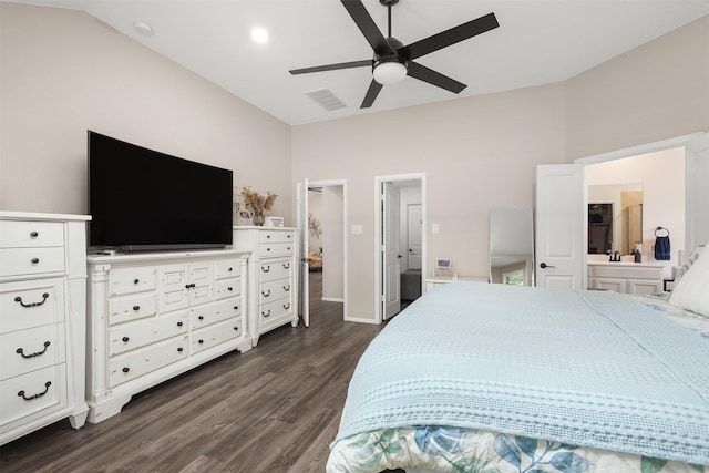 3051 Newcastle Crest Ln, Dickinson, TX 77539 - bedroom featuring dark wood-style flooring, vaulted ceiling, connected bathroom, and ceiling fan