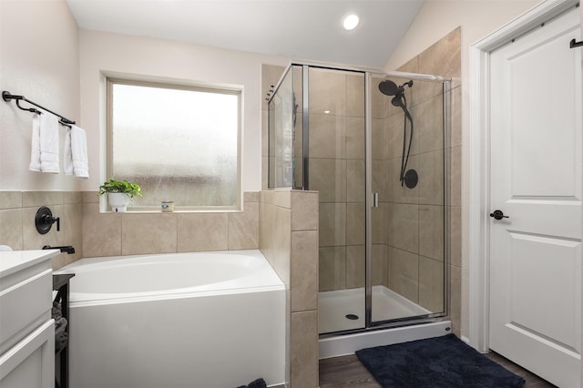 3051 Newcastle Crest Ln, Dickinson, TX 77539 - bathroom with a garden tub, a stall shower, and vanity
