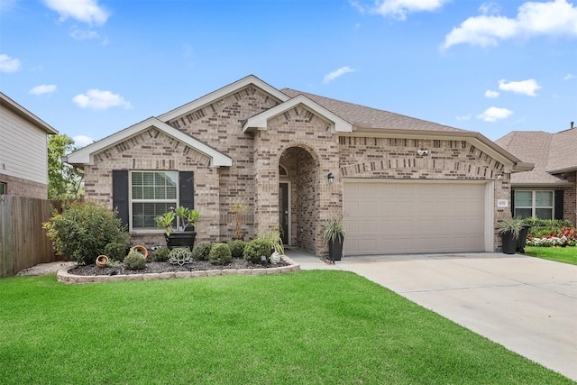 3051 Newcastle Crest Ln, Dickinson, TX 77539 - view of front facade featuring a garage, brick siding, driveway, and roof with shingles
