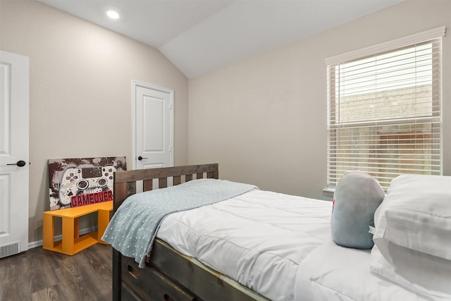 3051 Newcastle Crest Ln, Dickinson, TX 77539 - bedroom with dark wood-style flooring and lofted ceiling