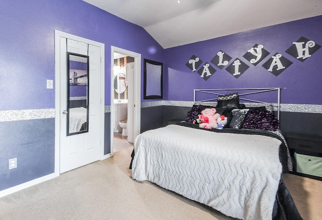 4723 Peninsula Garden Way, Humble, TX 77396 - bedroom featuring vaulted ceiling, carpet flooring, and ensuite bath