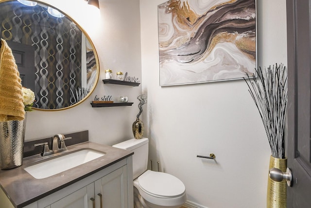 4723 Peninsula Garden Way, Humble, TX 77396 - bathroom featuring vanity and toilet