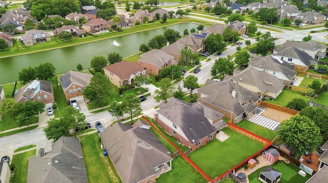 4723 Peninsula Garden Way, Humble, TX 77396 - aerial perspective of suburban area with a nearby body of water and property parcel outlined