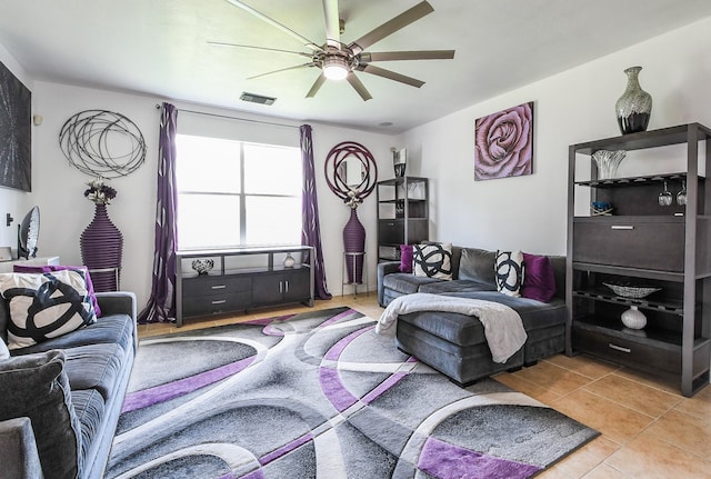 4723 Peninsula Garden Way, Humble, TX 77396 - living room with ceiling fan and light tile patterned floors