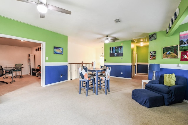 4723 Peninsula Garden Way, Humble, TX 77396 - dining space featuring ceiling fan, attic access, carpet flooring, and an office area