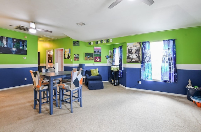 4723 Peninsula Garden Way, Humble, TX 77396 - dining room featuring a ceiling fan, carpet flooring, and attic access