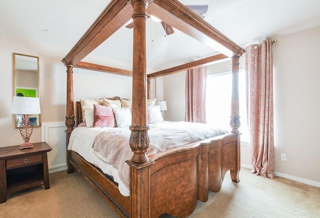 4723 Peninsula Garden Way, Humble, TX 77396 - bedroom with light colored carpet and a ceiling fan