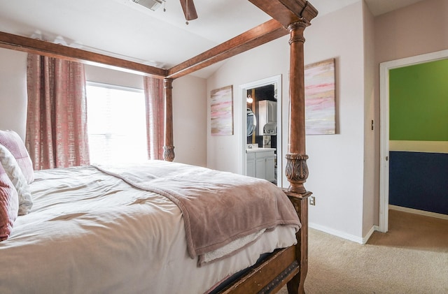 4723 Peninsula Garden Way, Humble, TX 77396 - bedroom featuring carpet flooring, connected bathroom, a ceiling fan, and lofted ceiling