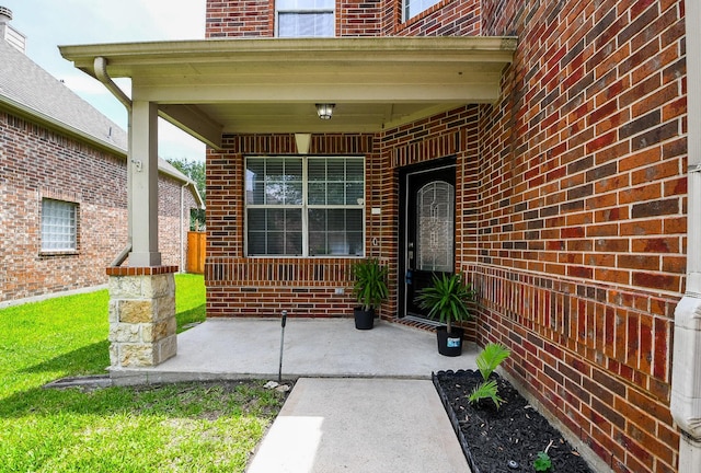 4723 Peninsula Garden Way, Humble, TX 77396 - entrance to property featuring brick siding and a porch