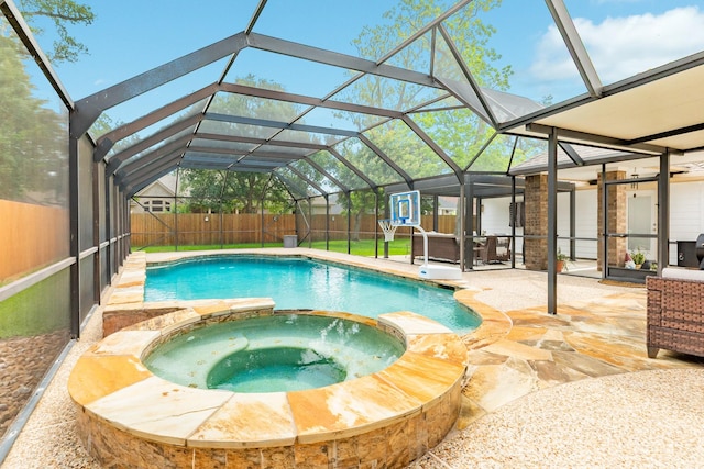 114 Arrowhead Dr, Lake Jackson, TX 77566 - view of swimming pool with a pool with connected hot tub, a patio, a fenced backyard, and a lanai
