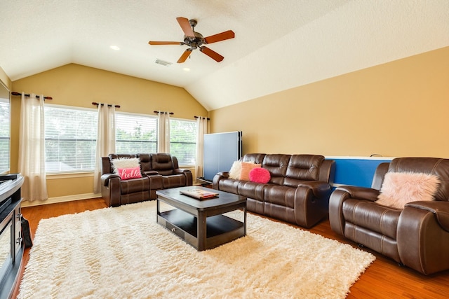 114 Arrowhead Dr, Lake Jackson, TX 77566 - living room featuring ceiling fan, lofted ceiling, wood finished floors, and recessed lighting