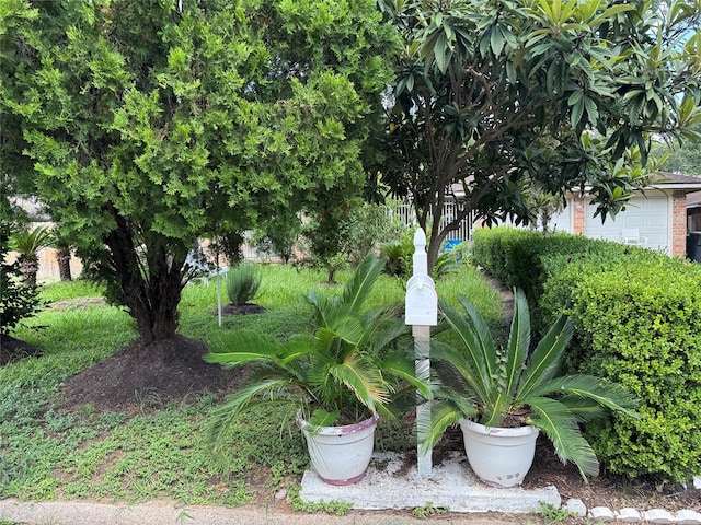 9227 Vanwood St, Houston, TX 77040 - view of yard featuring a garage