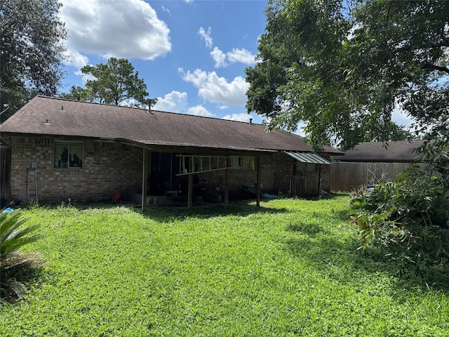 9227 Vanwood St, Houston, TX 77040 - back of house featuring brick siding and a shingled roof