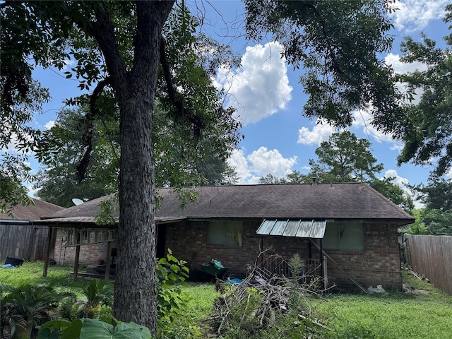 9227 Vanwood St, Houston, TX 77040 - view of side of property with brick siding and a shingled roof