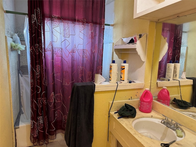 9227 Vanwood St, Houston, TX 77040 - full bath with vanity, shower / bath combo, and a textured wall
