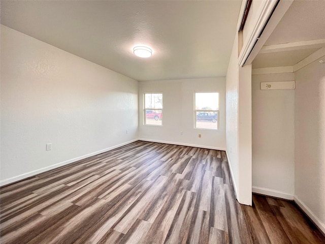 2328 Wimcrest St, Galveston, TX 77551 - empty room featuring dark wood finished floors and baseboards