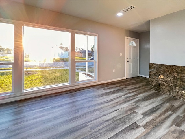 2328 Wimcrest St, Galveston, TX 77551 - foyer entrance with wood finished floors, healthy amount of natural light, and recessed lighting