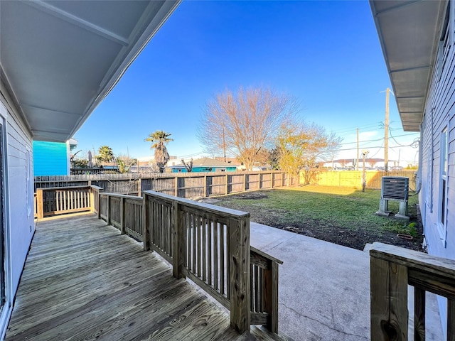 2328 Wimcrest St, Galveston, TX 77551 - wooden deck featuring a fenced backyard and a patio area