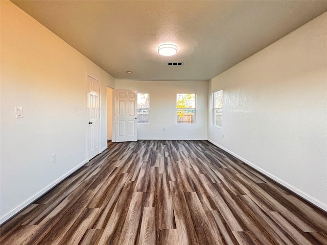 2328 Wimcrest St, Galveston, TX 77551 - empty room with dark wood-style flooring and baseboards