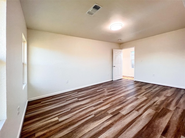 2328 Wimcrest St, Galveston, TX 77551 - empty room with baseboards and dark wood finished floors