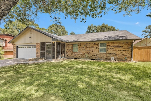 202 Twin Harbors Dr, Onalaska, TX 77360 - single story home featuring brick siding, an attached garage, driveway, and a sunroom