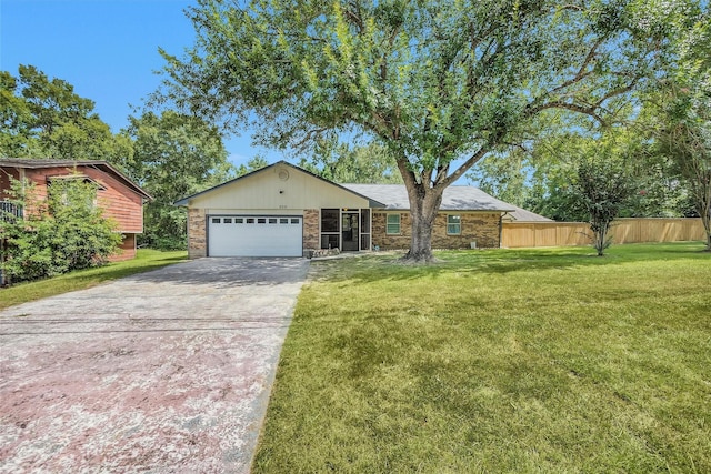 202 Twin Harbors Dr, Onalaska, TX 77360 - single story home featuring concrete driveway, a garage, and stone siding
