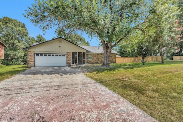 202 Twin Harbors Dr, Onalaska, TX 77360 - ranch-style house with driveway and an attached garage