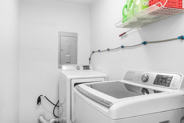 202 Twin Harbors Dr, Onalaska, TX 77360 - laundry room with electric panel and washing machine and clothes dryer