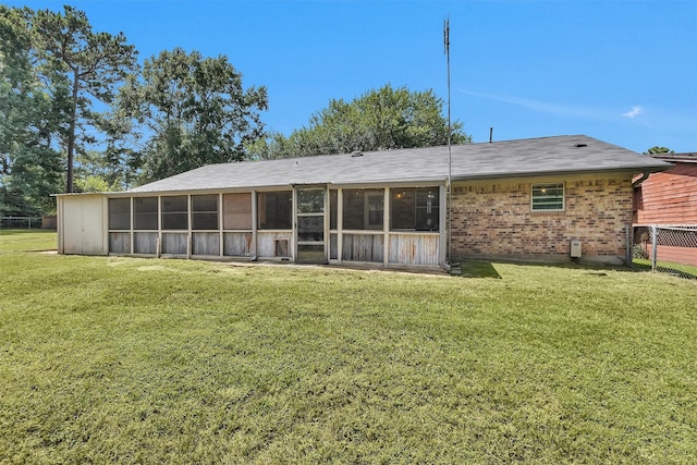 202 Twin Harbors Dr, Onalaska, TX 77360 - rear view of house with a sunroom and brick siding