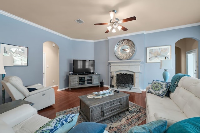 13603 Sand Mountain Ln, Houston, TX 77044 - living area featuring arched walkways, ceiling fan, ornamental molding, and wood finished floors