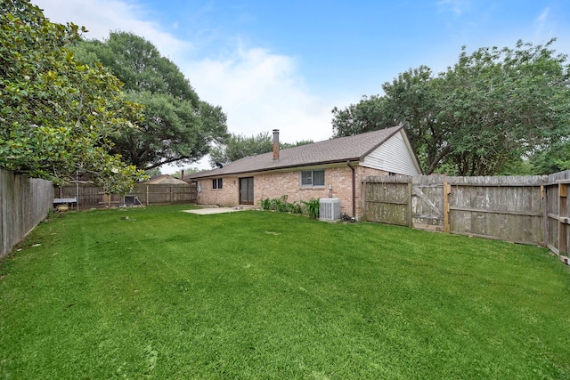 1617 Pecan Hollow St, Pearland, TX 77581 - fenced backyard with a patio area